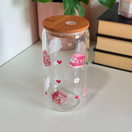 Glass with pink book pattern